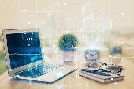 Double exposure of desktop with computer on background and tech theme drawing. Concept of big data.