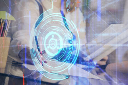 Multi exposure of womans writing hand on background with data technology hud. Big data concept.