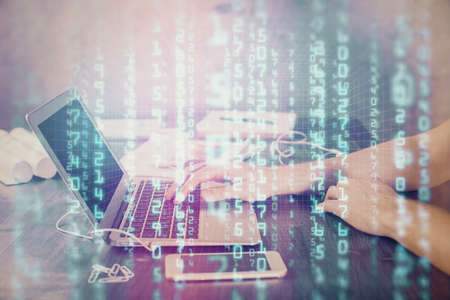 Businessman with computer background with technology theme hologram. Concept of hightech. Multi...