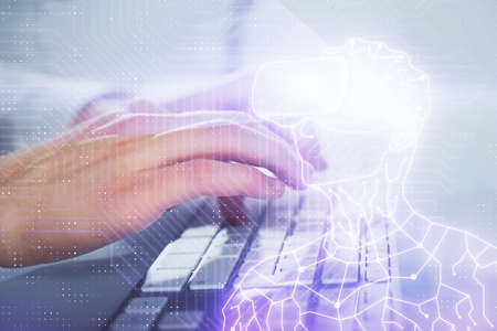 AR hologram with man working on computer on background. Augmented reality concept. Double exposure.