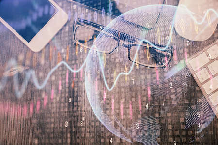 Multi exposure of forex graph hologram over desktop with phone. Top view. Mobile trade platform...