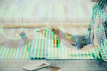 Businessman working on Laptop with technology theme drawing. Concept of big data. Double exposure.の写真素材
