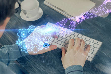 Double exposure of tech drawings with hands working on computer background. Concept of innovation.