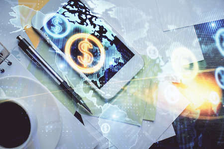 Multi exposure of forex graph hologram over desktop with phone. Top view. Mobile trade platform...
