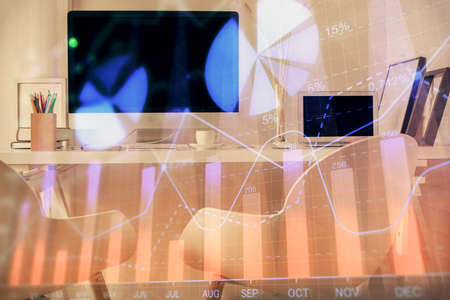 Double exposure of stock market graph drawing and office interior background. Concept of financial...