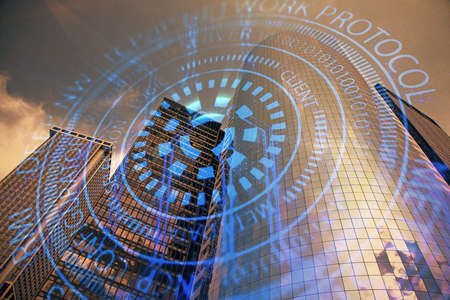 Data theme hologram drawing on city view with skyscrapers background multi exposure. Bigdata...