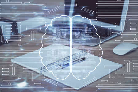 Multi exposure of work table with computer and brain hologram. Brainstorm concept.