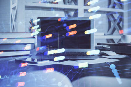 Technology theme drawing and work space with computer. Double exposure. Concept of innovation.の写真素材