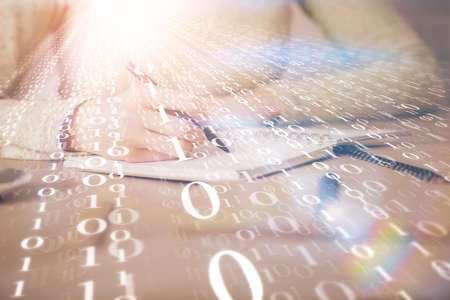 Double exposure of writing hand on background with data technology hologram. Big data concept.