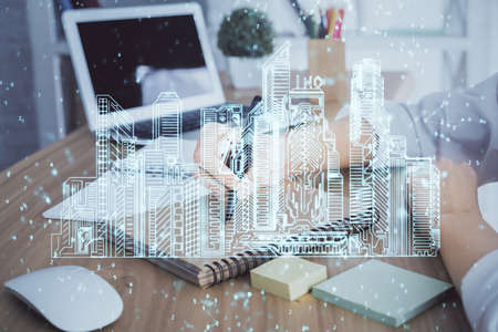IOT drawing over writing hands in notepad background. Concept of smaert home. Multi exposure