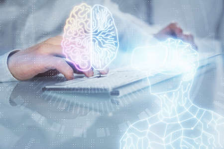 AR hologram with man working on computer on background. Augmented reality concept. Double exposure.の写真素材