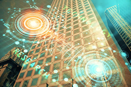 Data theme hologram drawing on city view with skyscrapers background multi exposure. Bigdata...