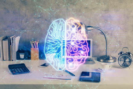 Double exposure of desktop with computer and brain drawing hologram. Artificial intelligence concept.の写真素材