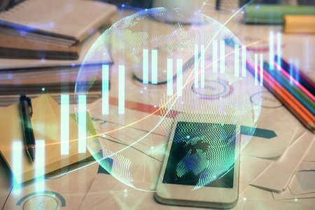 Double exposure of forex chart drawing and cell phone background. Concept of financial data analysis