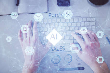 Multi exposure of man's hands typing over computer keyboard and data theme hologram drawing. Top...