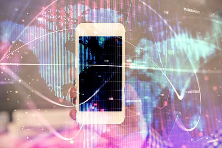 Double exposure of man's hands holding and using a phone and international business theme drawing.