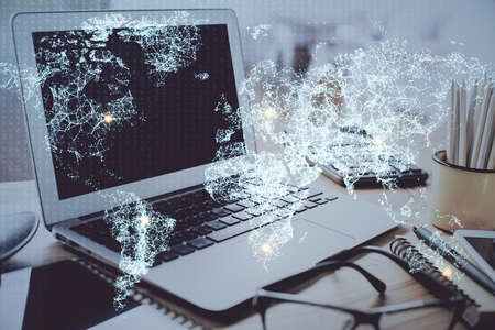 Computer on desktop with social network hologram. Double exposure. Concept of international people...