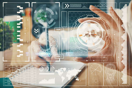 Multi exposure of writing hands on background with data solution hologram. Technology concept.