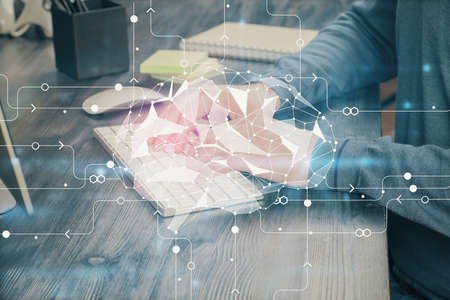 Man with computer background with brain theme hologram. Concept of brainstorm. Double exposure.