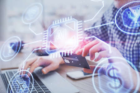 Double exposure of man hands holding a credit card and data theme drawing. E-commerce and technology...