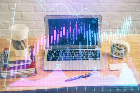 Multi exposure of forex graph and work space with computer. Concept of international online trading.の写真素材