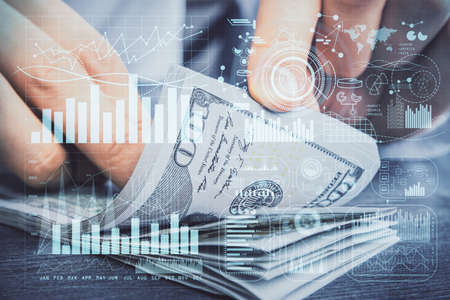 Multi exposure of forex graph drawing hologram and USA dollars bills and man hands. Technical Analysis concept.の写真素材