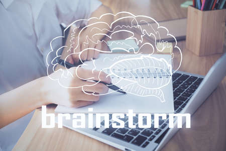 Start up creative drawing over close up hands on background. Concept of brainstorming. Multi...