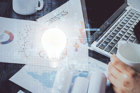Growing arrows with businessman working on computer on background. Success concept. Double exposure.