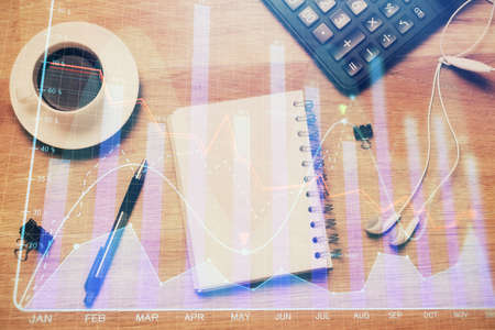 Multi exposure of forex chart drawing and work table top veiw. Concept of financial analysis.
