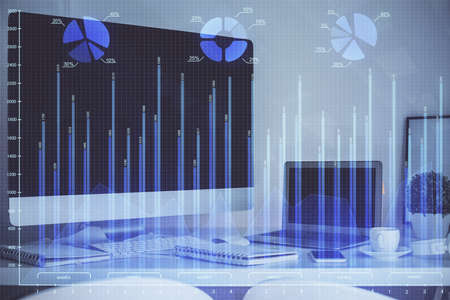 Double exposure of forex graph and work space with computer. Concept of international online...