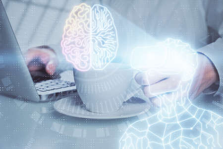 AR hologram with man working on computer on background. Augmented reality concept. Double exposure.