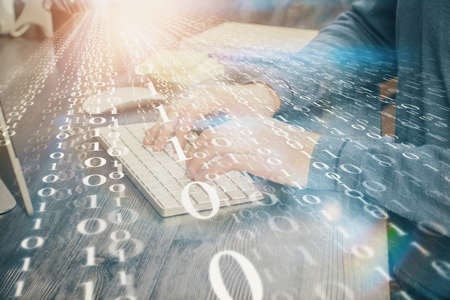 Double exposure of technology hologram with man working on computer background. Concept of big data.