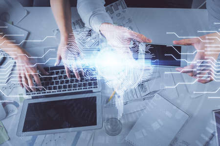 Double exposure of man and woman working together and human brain hologram drawing. Brainstorm...