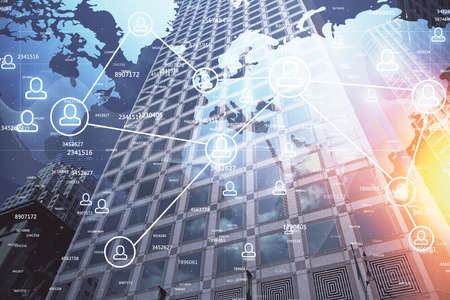 Double exposure of social network theme drawing and cityscape background. Concept of people connecton.の写真素材