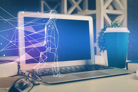 Desktop computer background in office and start up theme hologram drawing. Double exposure. Startup...