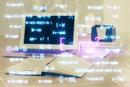 Desktop computer background and formula hologram writing. Double exposure. Education concept.