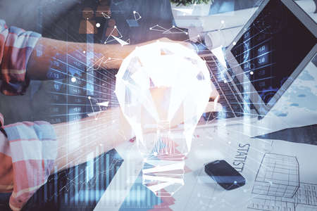 Growing arrows with businessman working on computer on background. Success concept. Double exposure.の写真素材