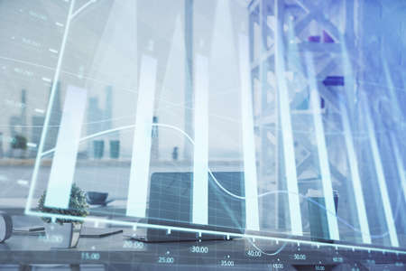 Double exposure of stock market graph drawing and office interior background. Concept of financial...