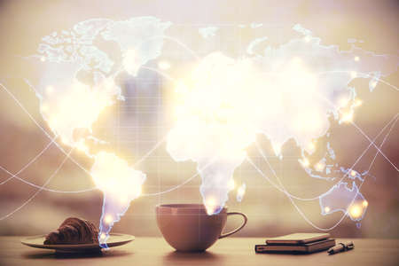 Double exposure of financial theme drawing hologram over coffee cup background in office. Concept of...
