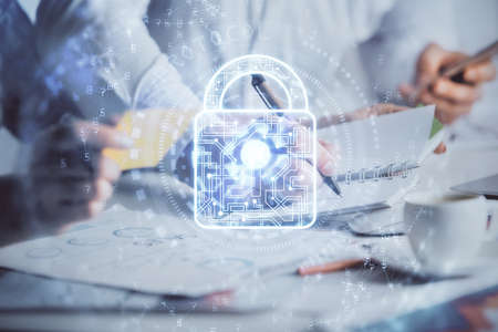 Double exposure of lock drawing over people taking notes background. Concept of security
