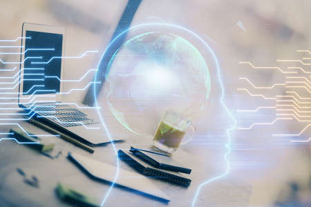 Double exposure of desktop with computer and brain drawing hologram. Artificial intelligence...