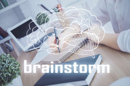 Start up creative drawing over close up hands on background. Concept of brainstorming. Multi exposureの写真素材