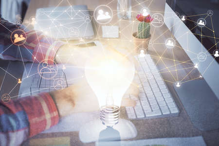 Social network theme hologram with businessman working on computer on background. Concept of world wide web. Double exposure.の写真素材