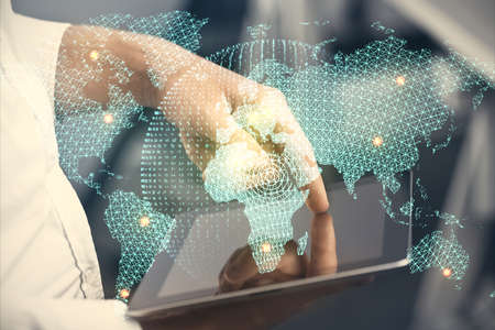 Double exposure of man's hands holding and using a phone and international business theme drawing.