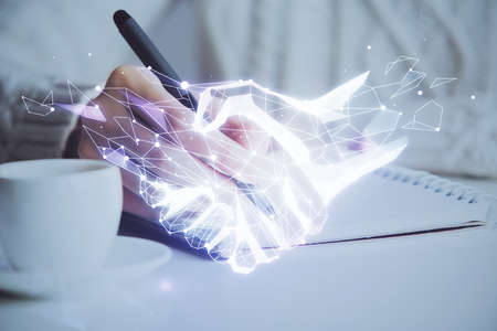 Handshake drawing over hands taking notes background. Concept of success. Double exposure