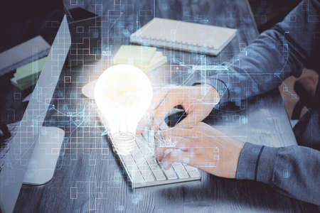 Growing arrows with businessman working on computer on background. Success concept. Double exposure.の写真素材