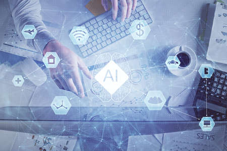 Double exposure of man's hands typing over computer keyboard and data theme hologram drawing. Top...