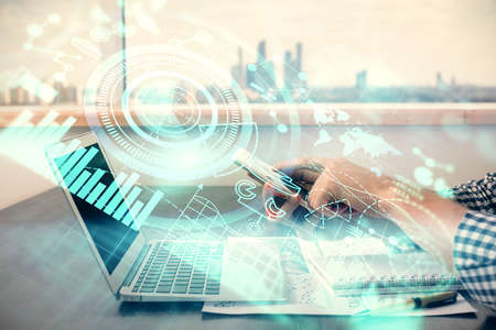Double exposure of man's hands holding and using a phone and international business theme drawing.