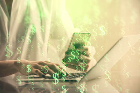 Double exposure of financial graph sketch hologram and woman holding and using a mobile device....