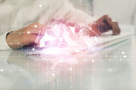 Man with computer background with brain theme hologram. Concept of brainstorm. Double exposure.